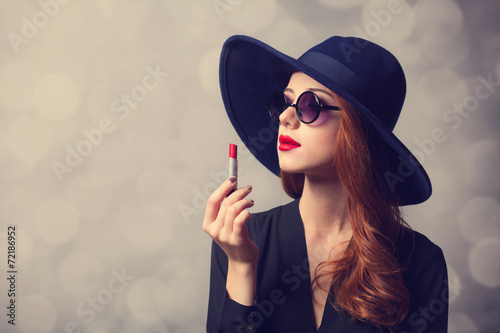 Canvas Print Style redhead women with sunglasses and lipstick.