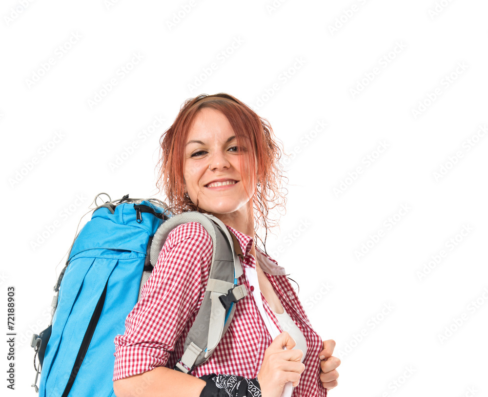 Pretty backpacker over isolated white background Pretty backpacker over isolated white background
