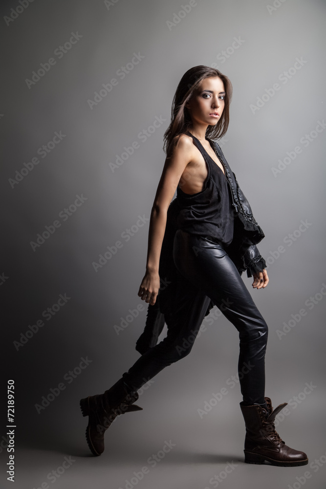 Fashion model wearing leather pants and jacket Fashion model wearing leather pants and jacket