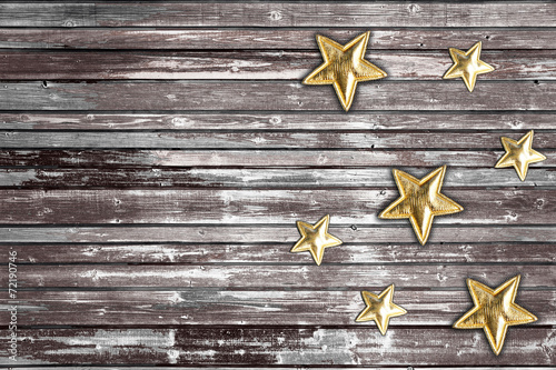 Christmas stars on a  wooden background