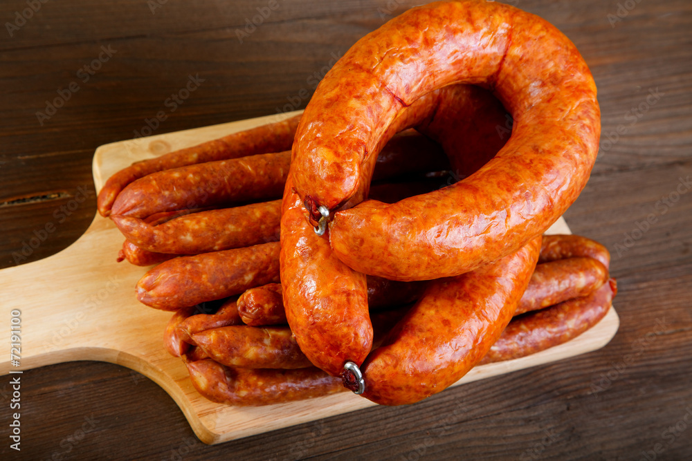 Smoked sausage on a kitchen table Smoked sausage on a kitchen table
