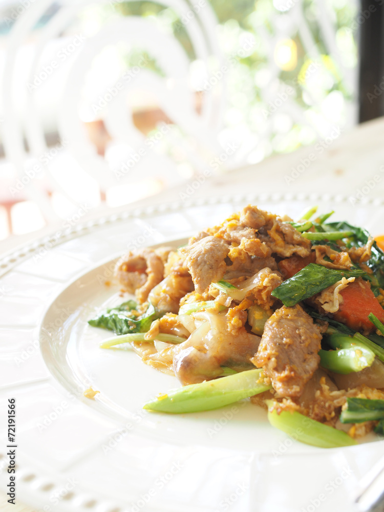 Pad See Ew, Stir fried flat noodle and pork with preserved soy b Pad See Ew, Stir fried flat noodle and pork with preserved soy b