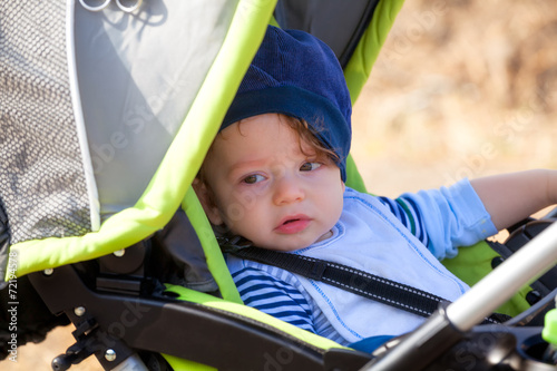 Babby boy in stroller photo