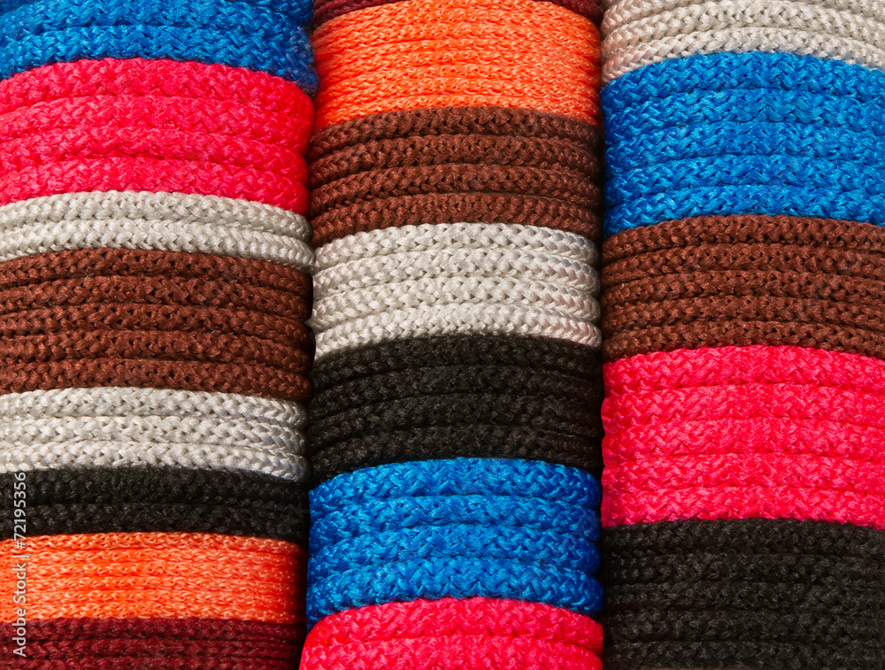 dense row of coloured yarns