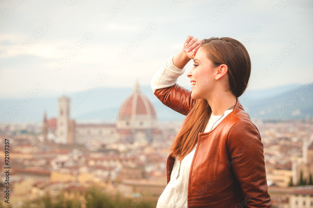 Beautiful girl impressed view the panorama of Florence in autumn Beautiful girl impressed view the panorama of Florence in autumn