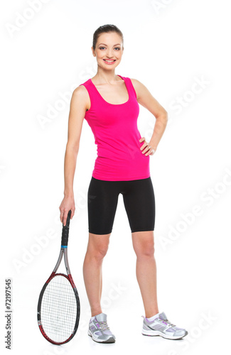 Young woman holding tennis racket on white background. © BlueSkyImages
