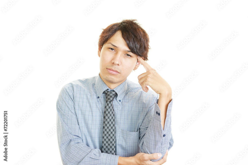 頭痛を訴えるビジネスマン