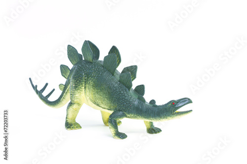 Stegosaurus dinosaur toy on white background © Praiwun Thungsarn