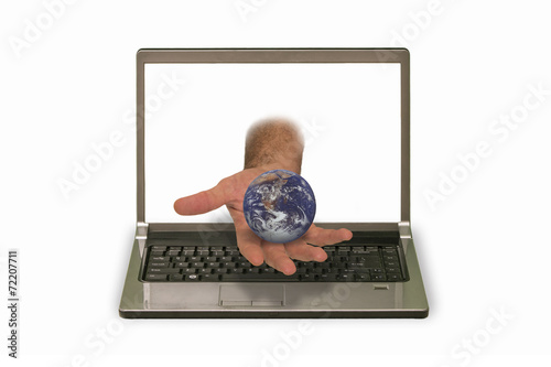 Hand with model of the planet  reaching out of laptop display