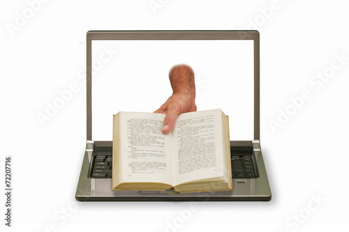 hand with book reaching out of laptop display