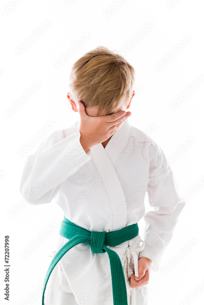 model isolated on plain background ashamed hiding face in hand model isolated on plain background ashamed hiding face in hand