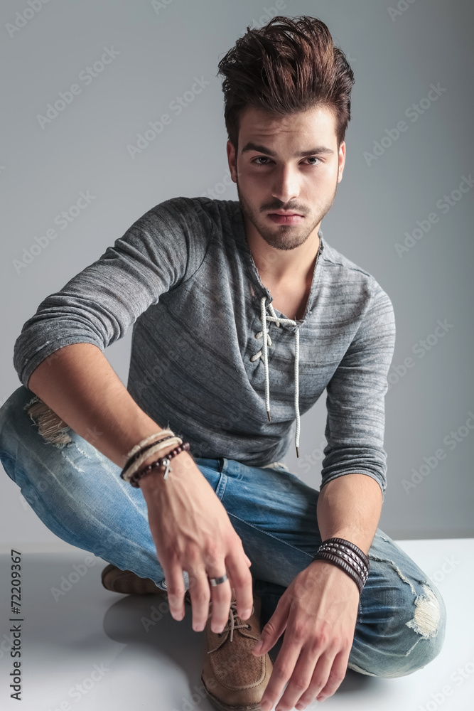 Handsome young fashion man looking at the camera. Handsome young fashion man looking at the camera.