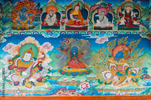 Old buddhist fresco at the gate of Chame village in Himalayan