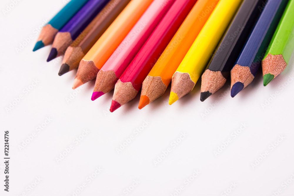 Many different colored pencils on white background Many different colored pencils on white background