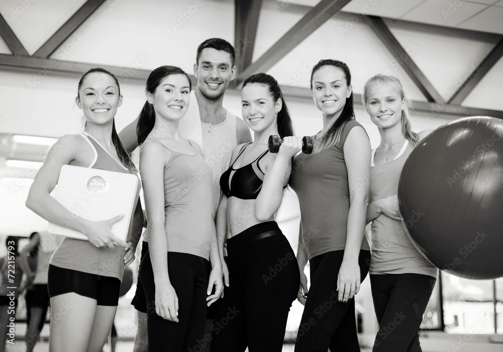 group of smiling people in the gym group of smiling people in the gym