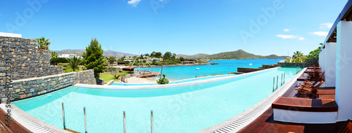 Panorama of swimming pool at luxury hotel, Crete, Greece © slava296