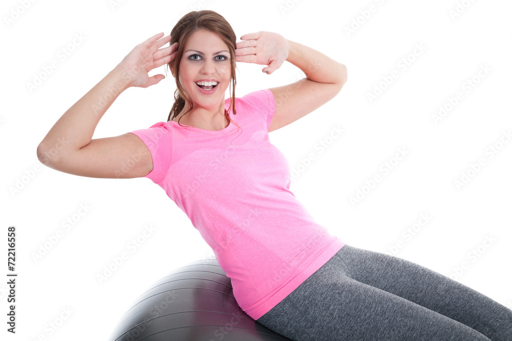 Sportliche Frau macht Bauchübung auf Gymnastikball Porträt Sportliche Frau macht Bauchübung auf Gymnastikball Porträt