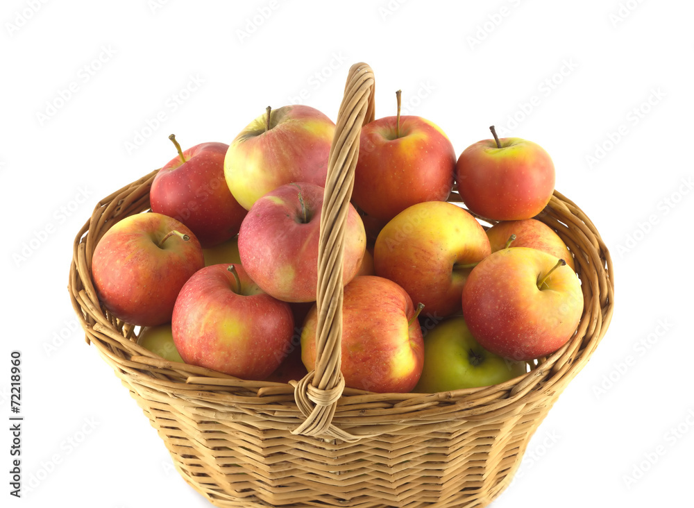 Ripe apples in wicker basket isolated Ripe apples in wicker basket isolated