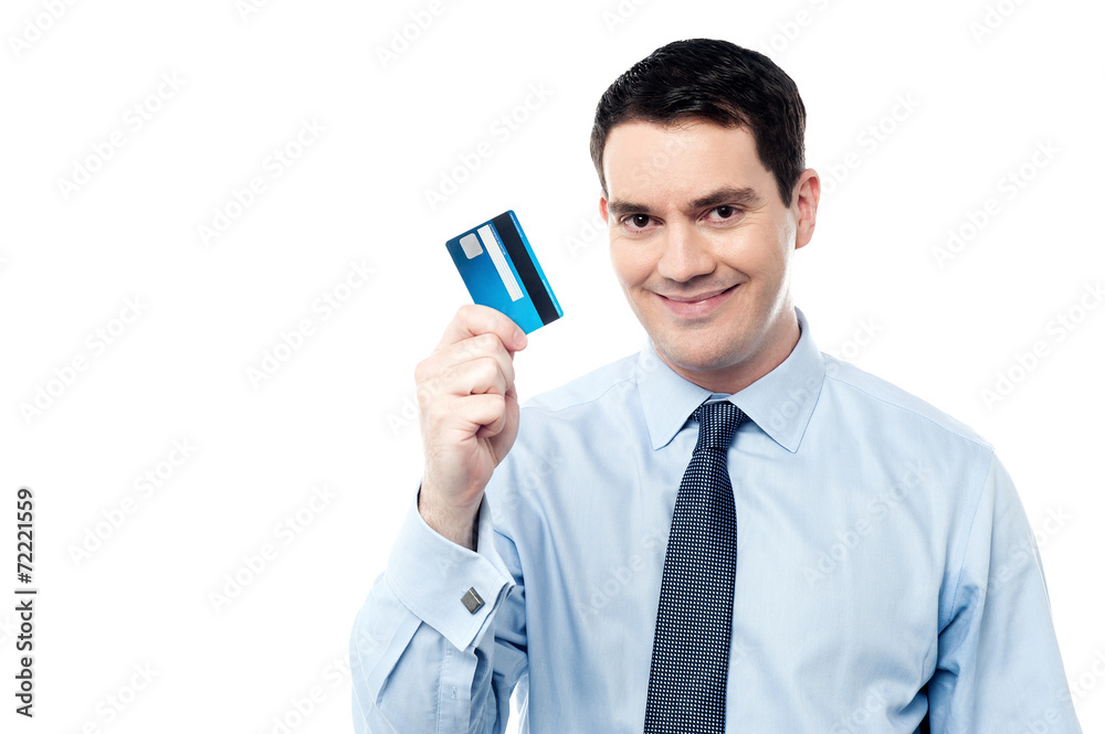 Corporate man holding debit card