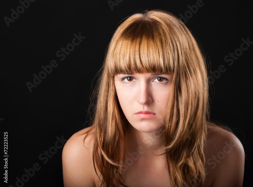 attractive woman with tears on her face
