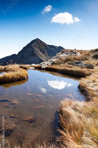 Mont Mucrone and a small mountain pond photo