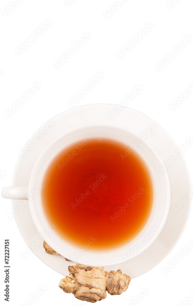 Ginger root and a cup of tea over white background
