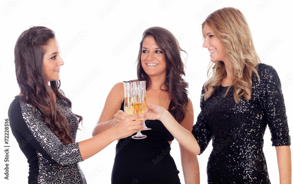 Group of friends toasting with champagne in Christmas Group of friends toasting with champagne in Christmas