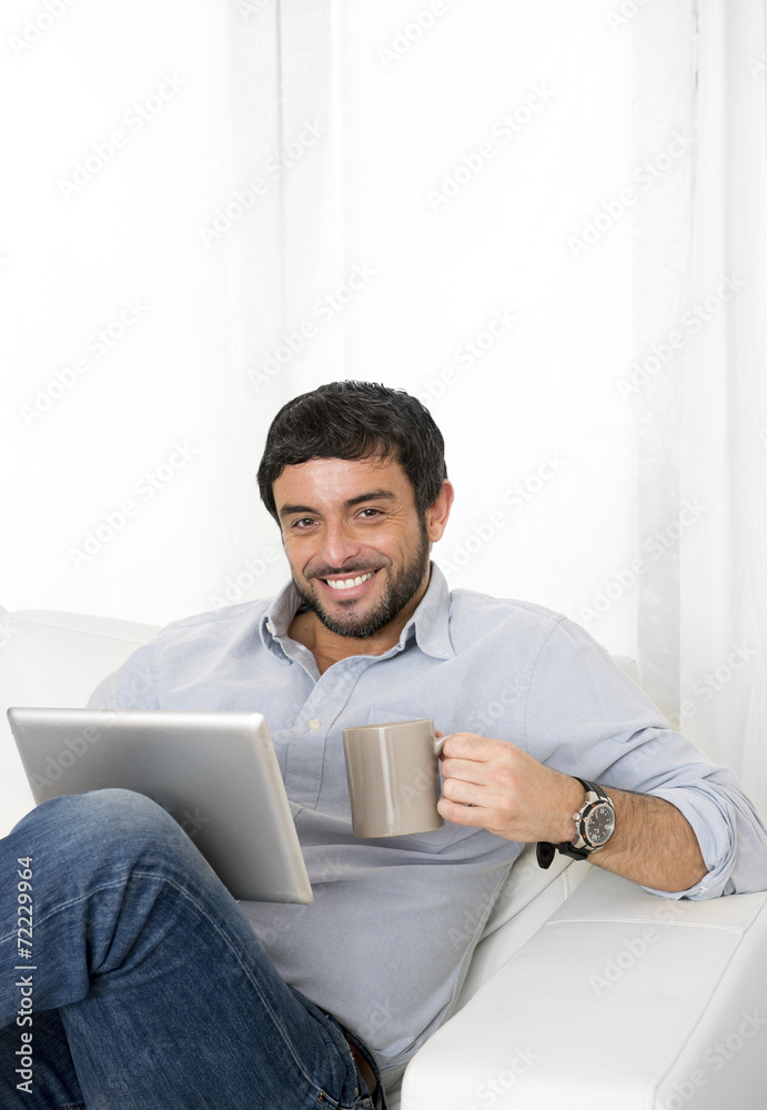 young man relax with coffee using online digital tablet pad young man relax with coffee using online digital tablet pad