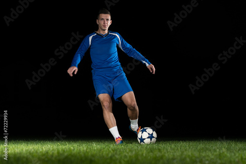 Football Player With Ball In Action