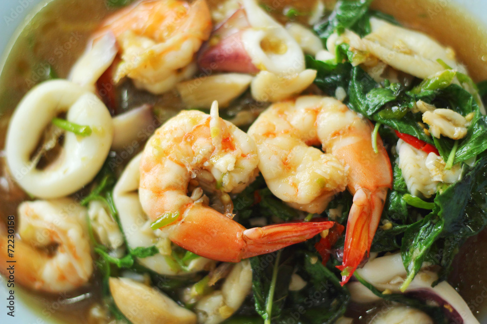 Spicy fried seafood, shrimp, squid. Spicy fried seafood, shrimp, squid.