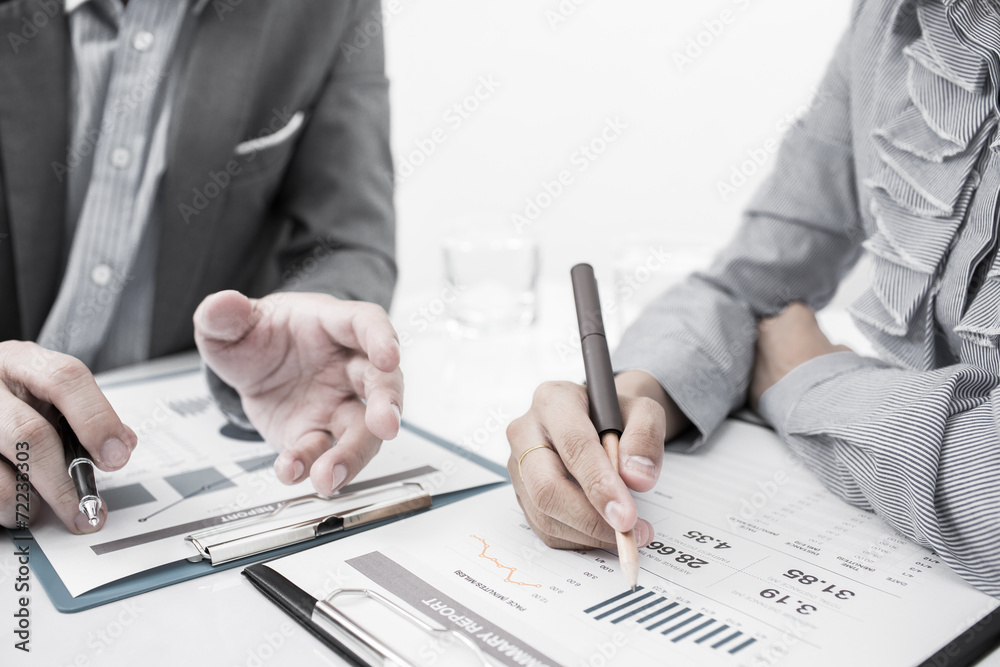Business people discussing during a meeting Business people discussing during a meeting