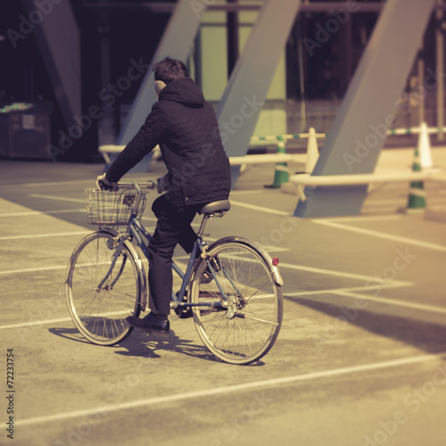 Man ride bicycle on street