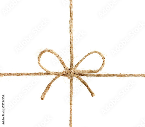 string or twine tied in a bow isolated on white background