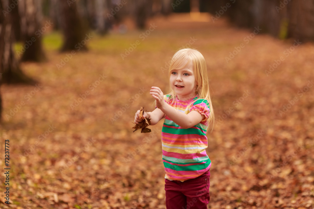 Beautiful girl jumping in autumn park. active, to rest Beautiful girl jumping in autumn park. active, to rest