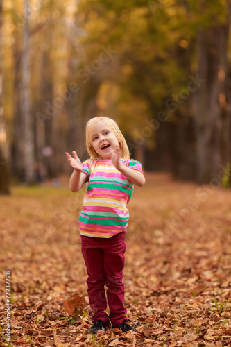 Beautiful girl jumping in autumn park. active, to rest