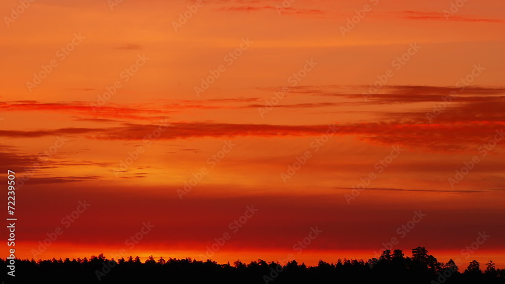 Timelapse shot of the morning sunrise through the clouds Timelapse shot of the morning sunrise through the clouds