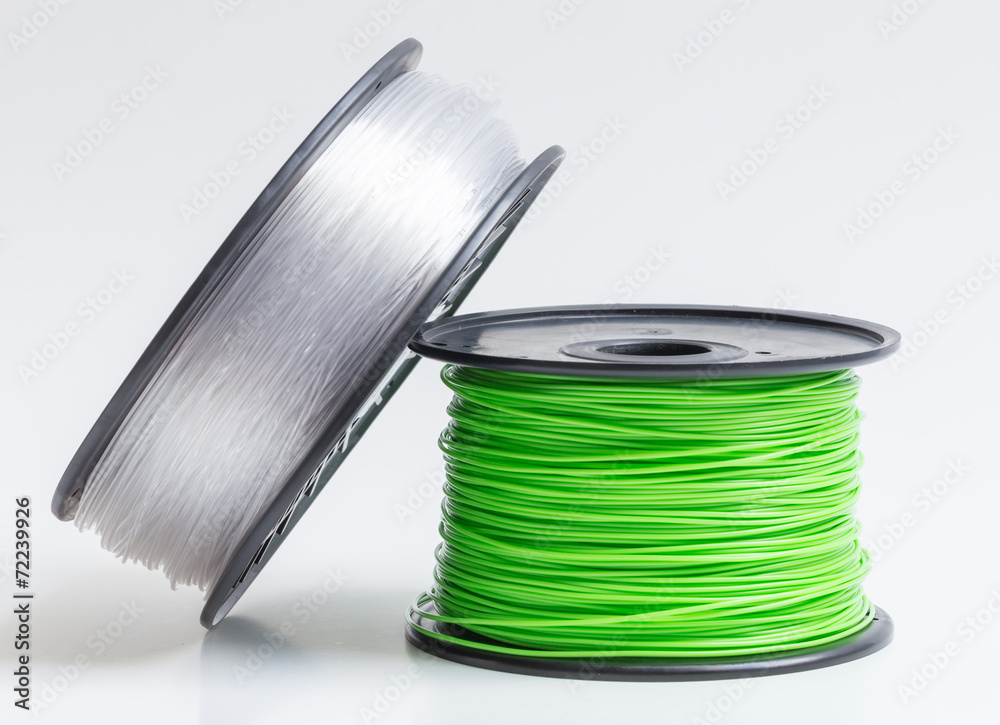 Filament für 3d Drucker glasklar und hellgrün vor hellem Hinte - obrazy, fototapety, plakaty 