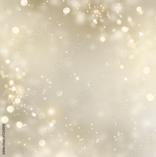 Christmas gold background. Golden holiday glowing background