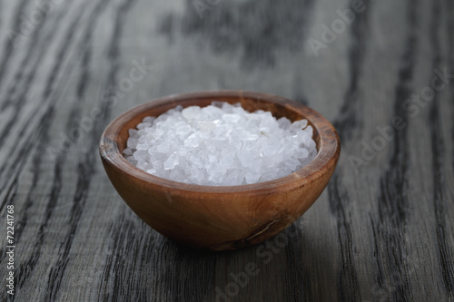 sea salt in wooden bowl for cooking or spa