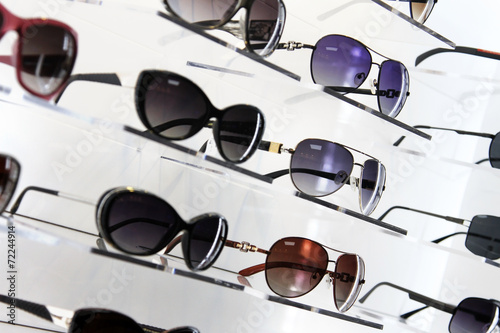 shop shelves with sunglasses #72244914