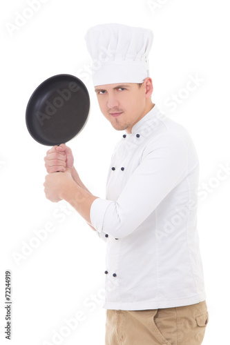 funny young handsome man chef in uniform with teflon frying pan