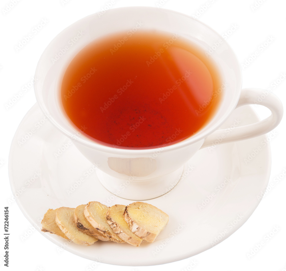Ginger slices and a cup of tea over white background Ginger slices and a cup of tea over white background