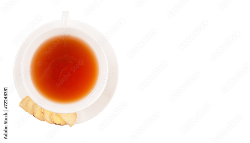 Ginger slices and a cup of tea over white background Ginger slices and a cup of tea over white background