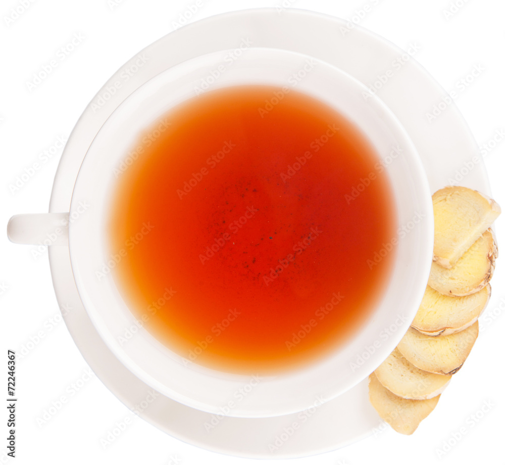 Ginger slices and a cup of tea over white background Ginger slices and a cup of tea over white background