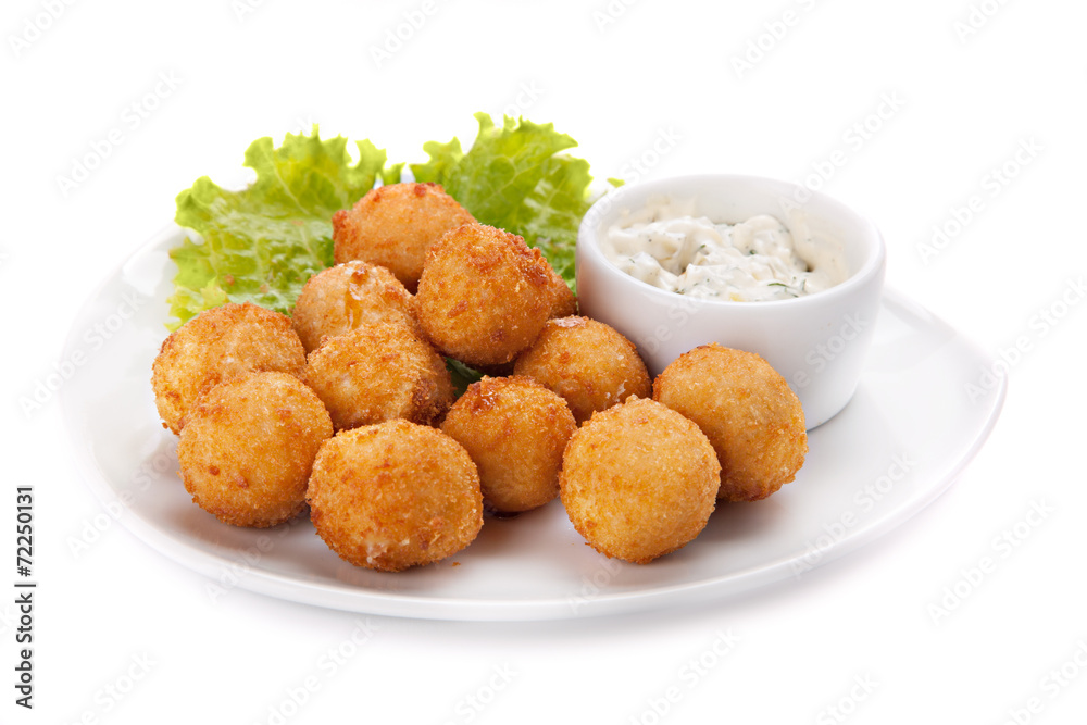 Deep fried cheese balls whith lettuce and sauce Deep fried cheese balls whith lettuce and sauce