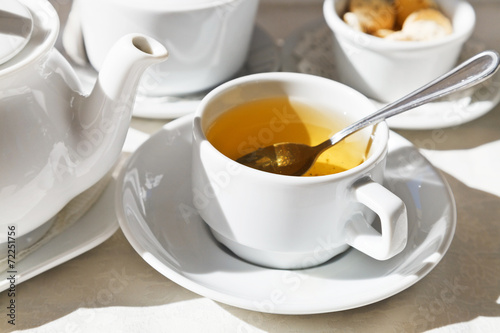 white porcelain cup with herbal tea