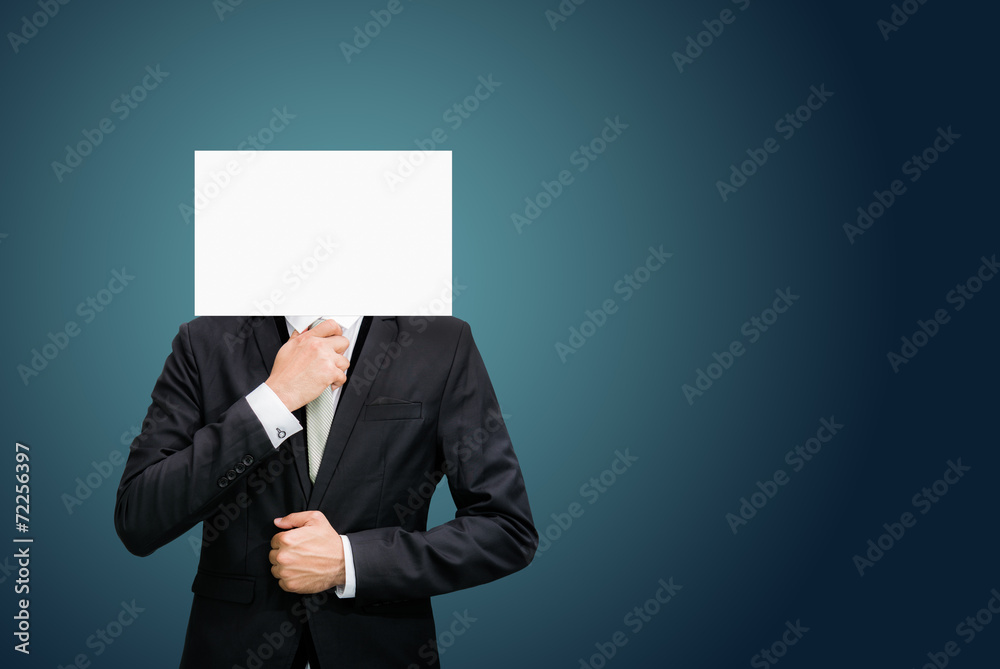 Businessman standing white paper face holding front of head Businessman standing white paper face holding front of head