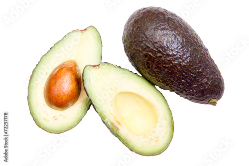 Some avocado seen from above on white background