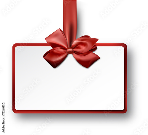 White paper gift card with red satin bow.