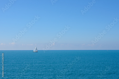 Blue sea, with yacht